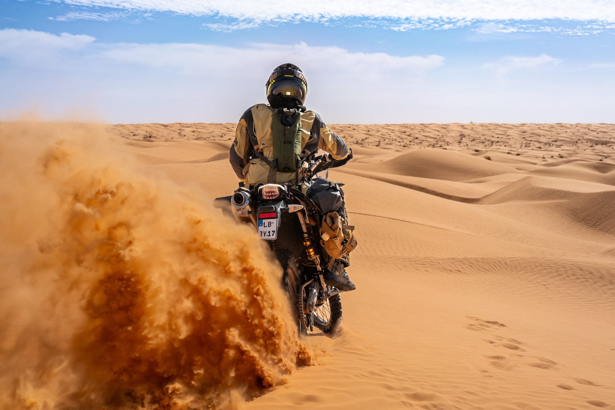 Motorcycle sand spray