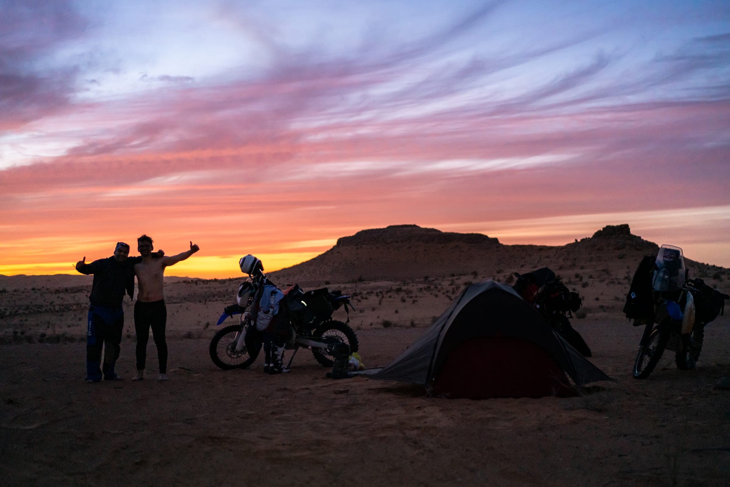 Sahara desert camp at sunset